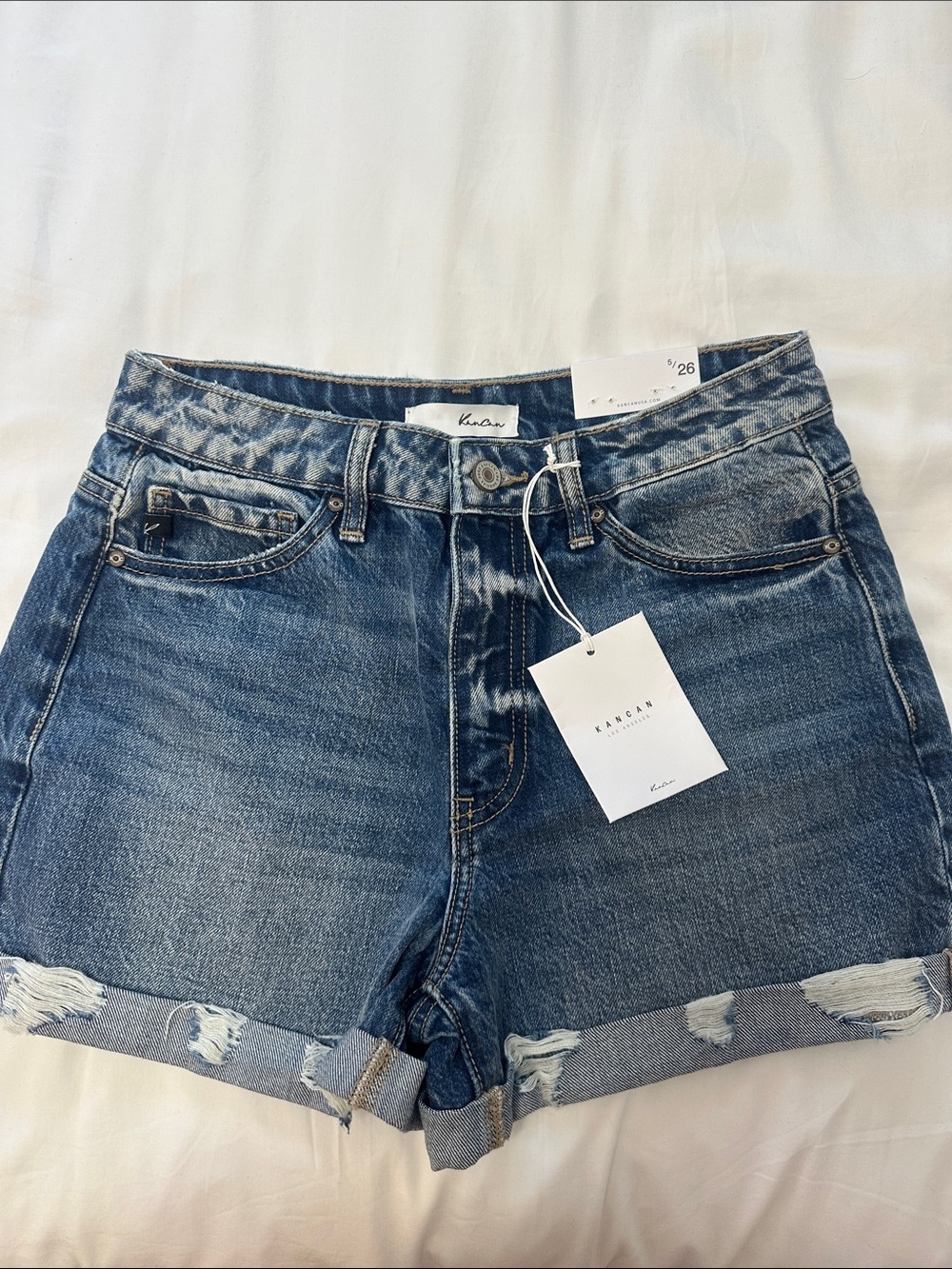 KanCan Mid-Rise Distressed Rolled Denim Shorts in Blue